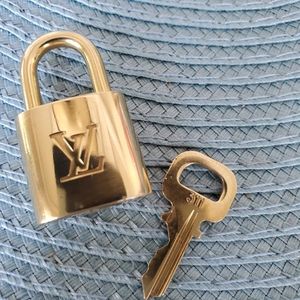 Louie Vuitton brass lock & key #311